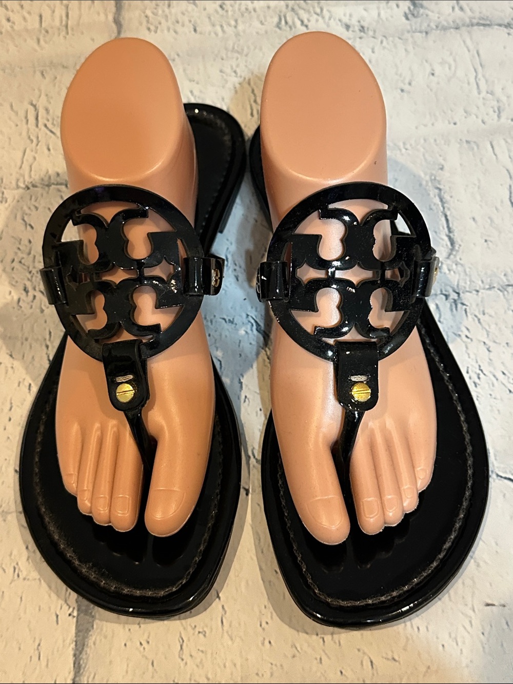 Tory Burch Black Patent Miller Thong Sandals with Round Cutout Medallion